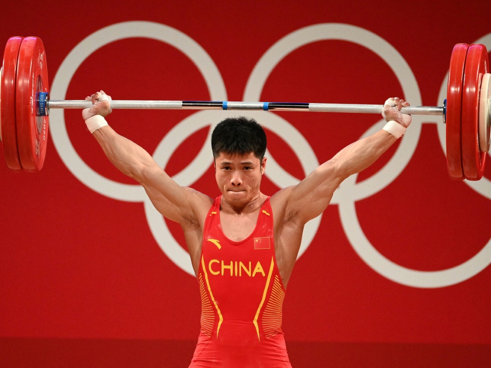 Gewichtheber Li Fabin gewinnt Gold für China (© AFP/SID/VINCENZO PINTO)